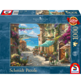 Schmidt Puzzle mit 1000 Teilen: Bunte Küstenort-Straßenszene von Thomas Kinkade auf dem Schachteldeckel.
