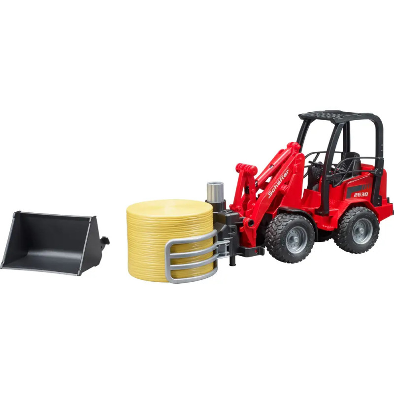 Rotes Spielzeug-Gabelstapler mit schwarzen Rädern, gelben Scheiben und abnehmbarer schwarzer Schaufel seitlich. Rotes Spielzeug-Gabelstapler mit schwarzen Rädern, gelben Scheiben und abnehmbarer schwarzer Schaufel seitlich.