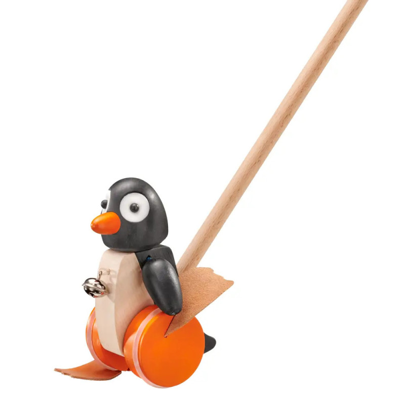 Schiebespielzeug: Spielzeug-Pinguin auf Rädern mit Holzstiel zum Schieben für Kinder. Schiebespielzeug: Spielzeug-Pinguin auf Rädern mit Holzstiel zum Schieben für Kinder.