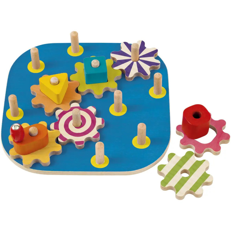 Bunte Holzzahnräder und Formen auf einem blauen Steckbrett, geeignet für spielerisches Kinderlernen. Bunte Holzzahnräder und Formen auf einem blauen Steckbrett, geeignet für spielerisches Kinderlernen.