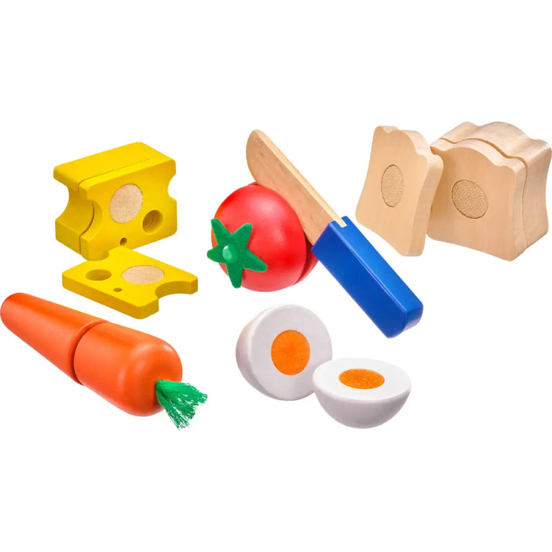 Holzspiel-Lebensmittelset mit Brot, Käse, Tomate, Karotte, Ei-Hälften und Messer mit blauem Griff. Holzspiel-Lebensmittelset mit Brot, Käse, Tomate, Karotte, Ei-Hälften und Messer mit blauem Griff.