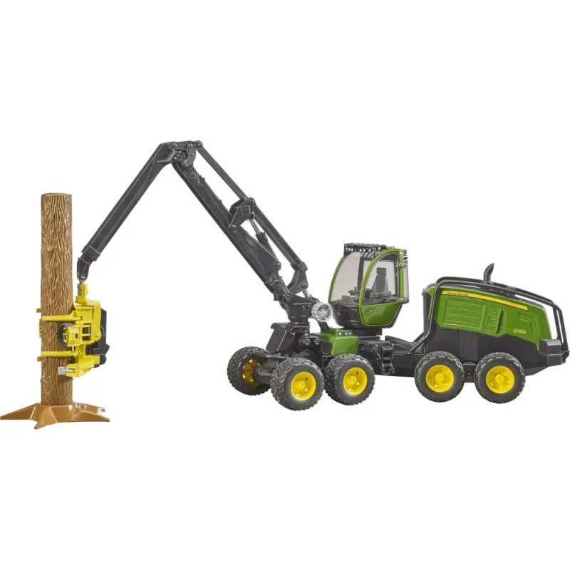 Eine grün-gelbe Forstmaschine hält einen stehenden Baumstamm mit ihrem langen mechanischen Greifarm. Eine grün-gelbe Forstmaschine hält einen stehenden Baumstamm mit ihrem langen mechanischen Greifarm.