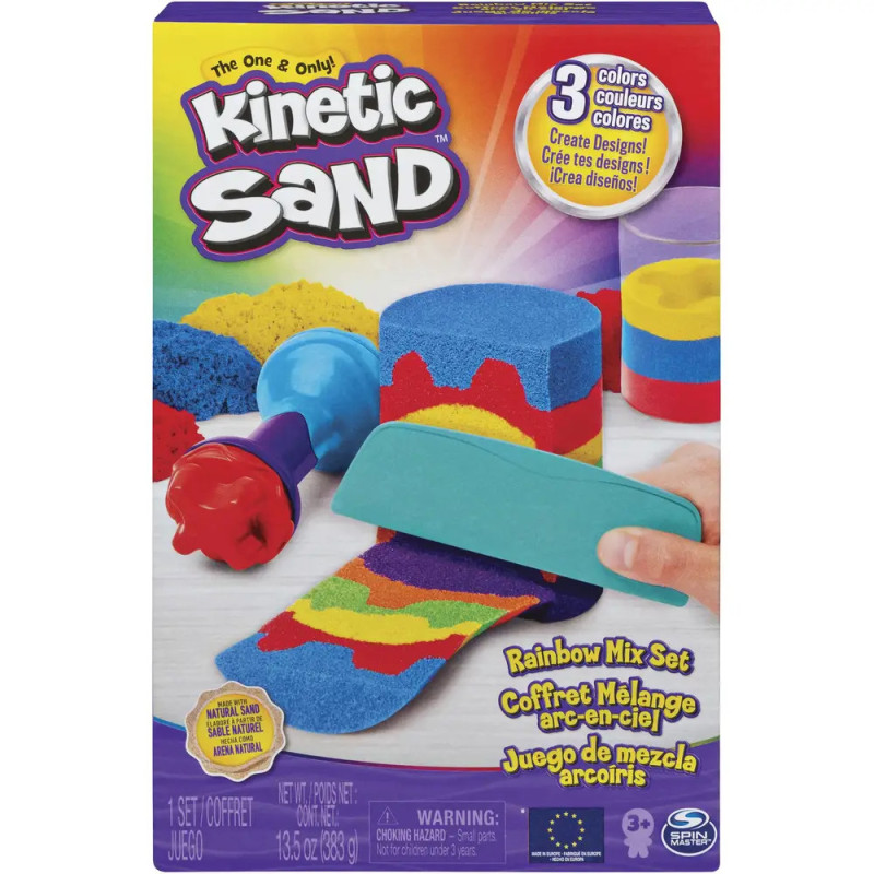 Box des Kinetic Sand Rainbow Mix Sets mit buntem Sand und abgebildeten Formwerkzeugen auf der Vorderseite.