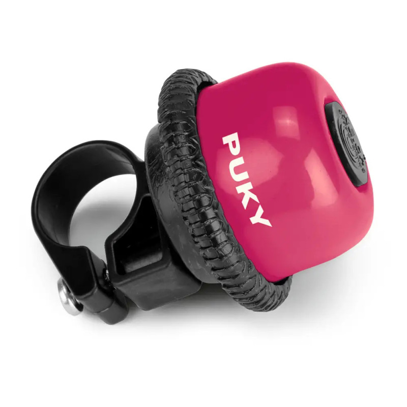 Pinkfarbene Fahrradklingel mit schwarzer Halterung, seitlich weißer PUKY-Schriftzug.