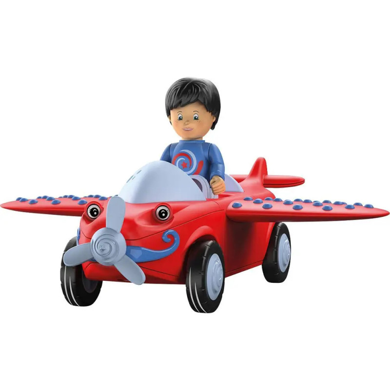 Spielzeugfigur eines Kindes mit dunklen Haaren in einem roten Flugzeug mit blauen Akzenten und grauem Propeller. Spielzeugfigur eines Kindes mit dunklen Haaren in einem roten Flugzeug mit blauen Akzenten und grauem Propeller.