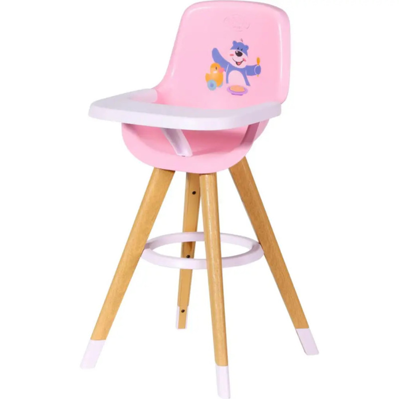 Rosa Kinderhochstuhl mit Holzbeinen und Bärenmotiv auf der Rückenlehne, für Kleinkinder geeignet. Rosa Kinderhochstuhl mit Holzbeinen und Bärenmotiv auf der Rückenlehne, für Kleinkinder geeignet.