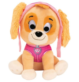 Plüschhund mit Schlappohren, rosa Fliegerkappe und Weste sitzt und lächelt.