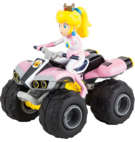 Princess Peach Figur in pinkem Rennanzug fährt ein pink-schwarzes Quad-Spielzeugfahrzeug.