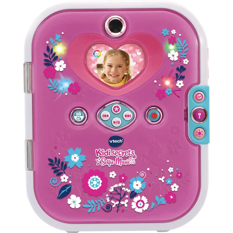 Pinkes VTech Kidisecrets Tagebuch mit Blumenmustern, Tasten und kleinem Bildschirm, der ein Mädchenfoto anzeigt. Pinkes VTech Kidisecrets Tagebuch mit Blumenmustern, Tasten und kleinem Bildschirm, der ein Mädchenfoto anzeigt.