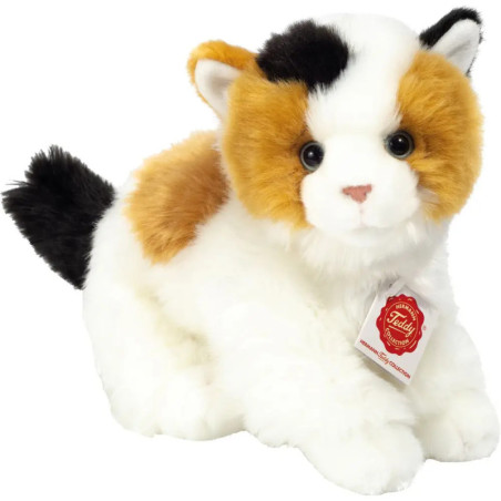 Plüsch-Katzenfigur mit weiß-orange-schwarzem Fell und Teddy Hermann-Etikett am Hals.