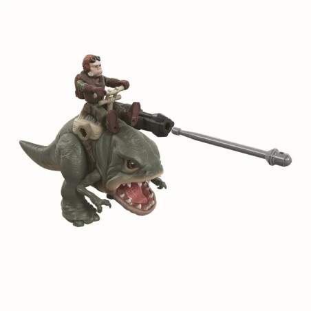 Spielfigur: Eine Person reitet auf einem grünen Dinosaurier mit einer großen Waffe auf dessen Rücken. Spielfigur: Eine Person reitet auf einem grünen Dinosaurier mit einer großen Waffe auf dessen Rücken.