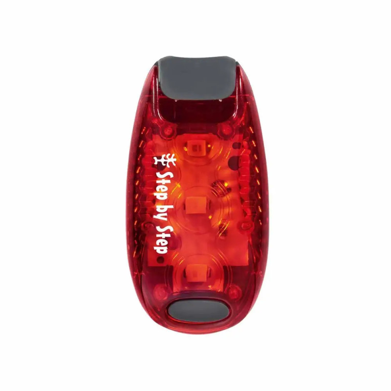 Rotes LED-Sicherheitslicht mit Step by Step-Schriftzug aus der Vogelperspektive vor weißem Hintergrund.