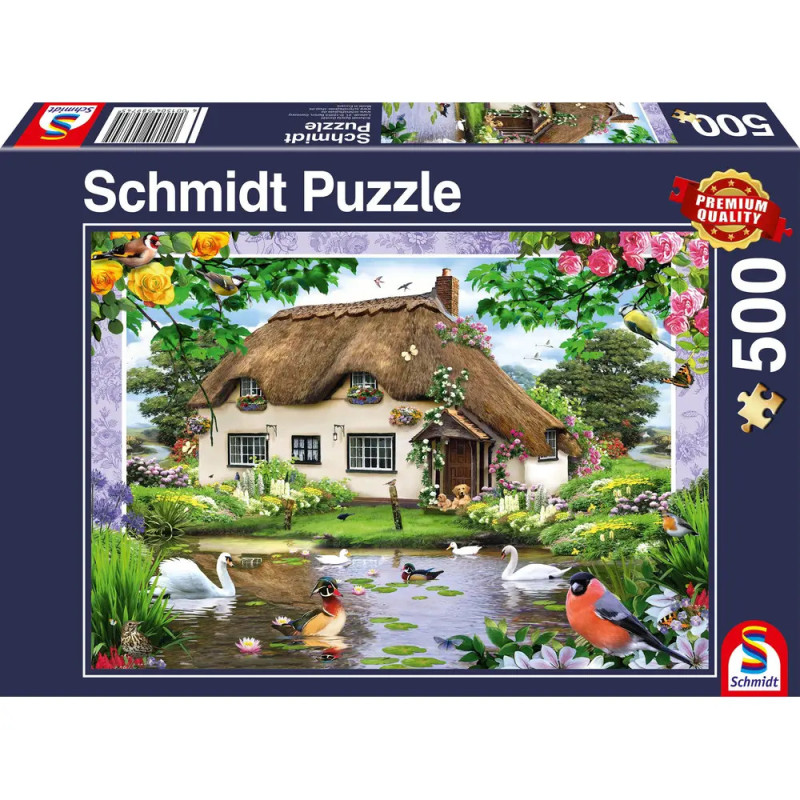 Schmidt Puzzle mit 500 Teilen: Das Motiv zeigt ein Häuschen am Teich mit Vögeln, Schwänen und bunten Blumen.