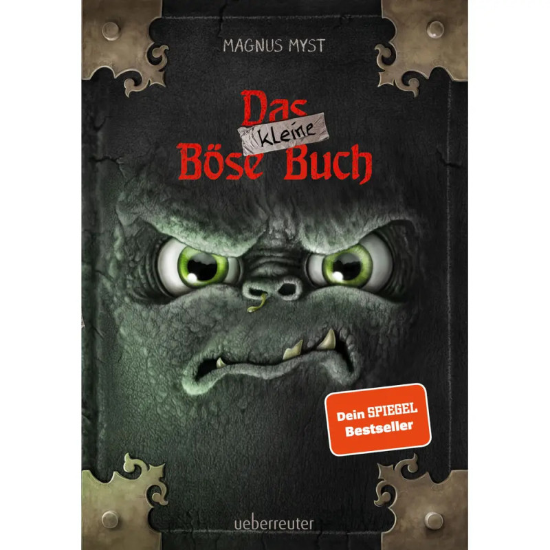 Buchcover mit grünem, wütendem Monster-Gesicht und dem Titel Das kleine böse Buch von Magnus Myst.
