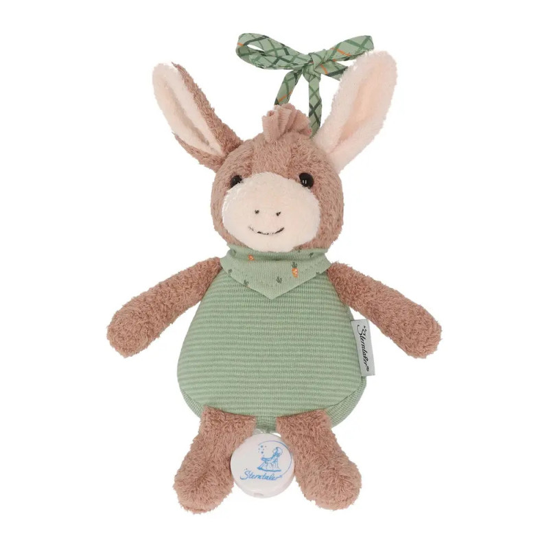 Plüsch-Esel mit grünem Halstuch und Schleife auf dem Kopf sitzt aufrecht und lächelt.