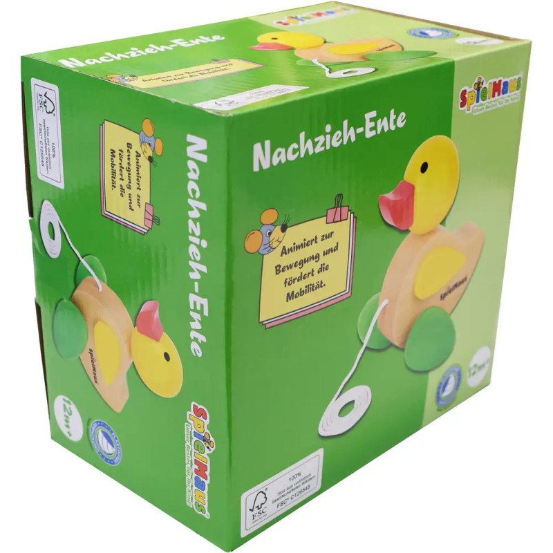 Grüne Box mit gelbem Holz-Nachzieh-Entchen, Aufschrift Nachzieh-Ente auf der Verpackung. Grüne Box mit gelbem Holz-Nachzieh-Entchen, Aufschrift Nachzieh-Ente auf der Verpackung.