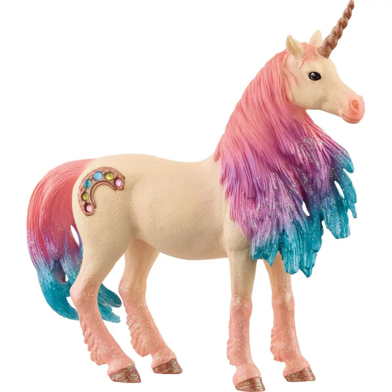 Ein Einhorn-Spielzeug mit rosa-blauer Mähne, goldenem Horn und juwelenbesetztem Halbmond an der Seite.