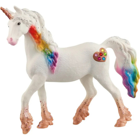 Weißes Einhornspielzeug mit Regenbogenmähne, glitzernden Hufen und bunten Edelsteinen an der Seite. Weißes Einhornspielzeug mit Regenbogenmähne, glitzernden Hufen und bunten Edelsteinen an der Seite.