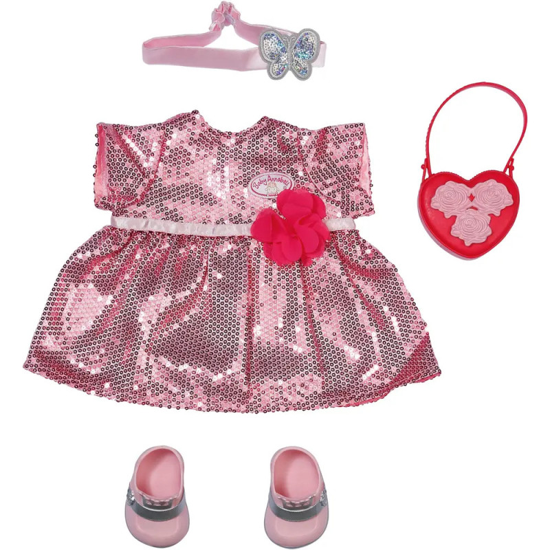 Glitzerndes pinkes Puppenkleid mit passenden Schuhen, Schmetterlingshaarreif und roter herzförmiger Tasche. Glitzerndes pinkes Puppenkleid mit passenden Schuhen, Schmetterlingshaarreif und roter herzförmiger Tasche.