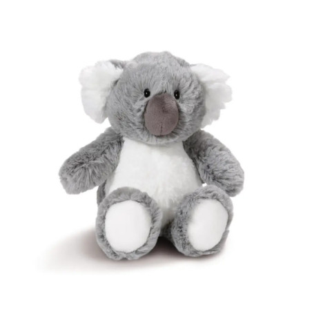 Ein grau-weißes Koala-Stofftier sitzt aufrecht auf weißem Hintergrund. Ein grau-weißes Koala-Stofftier sitzt aufrecht auf weißem Hintergrund.