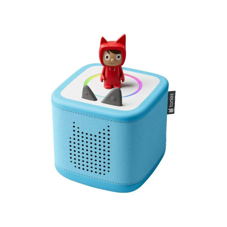 Blaue Toniebox mit roter Figur obenauf und zwei grauen Steuerohr-Lautstärkereglern. Blaue Toniebox mit roter Figur obenauf und zwei grauen Steuerohr-Lautstärkereglern.