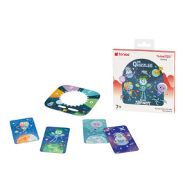 Kinderspiel mit bunten Tierkarten, rundem Spielbrett und Schachtel mit Aufschrift Die Quizzles.