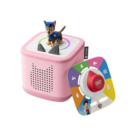 Pinkfarbene Toniebox mit einer Paw Patrol Figur und buntem Zubehör daneben.