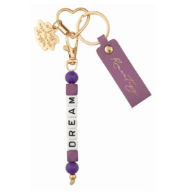 Goldener Schlüsselanhänger mit lila Anhänger, Herz und DREAM-Perlen in Weiß und Lila.
