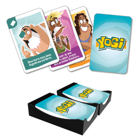 Yogi Kartenspiel mit bunten Charakterkarten und zwei Kartenstapeln in schwarzen Ablageschalen.