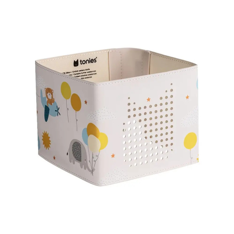 Weiße Toniebox-Hülle mit bunten Ballons, einem Elefanten und spielerischen Cartoon-Figuren an den Seiten.