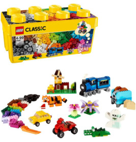 Gelbe LEGO-Classic-Box mit bunten Steinen und Modellen wie Zug und Tieren.