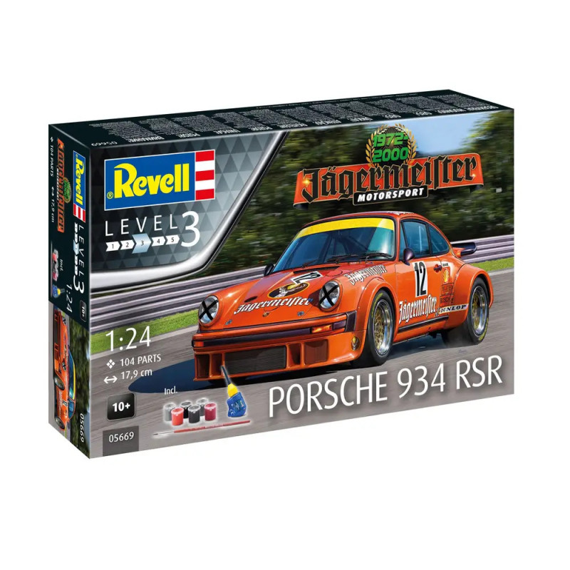 Revell Level 3 Bausatz: Porsche 934 RSR, orange Rennwagen und Malzubehör auf der Verpackung abgebildet.