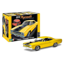 Ein gelbes 1970er Plymouth Road Runner Modellauto steht neben seiner Revell-Bausatzschachtel.