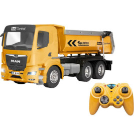 Gelber Spielzeug-Kipplaster mit schwarzen Details neben gelber Fernbedienung mit Joysticks und Knöpfen.