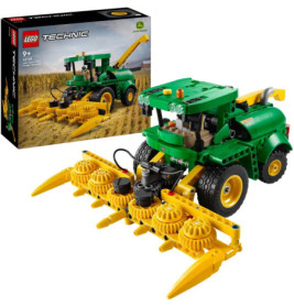 LEGO Technic John Deere Traktor mit gelbem Frontanbau, im Hintergrund ist die Verpackung zu sehen.