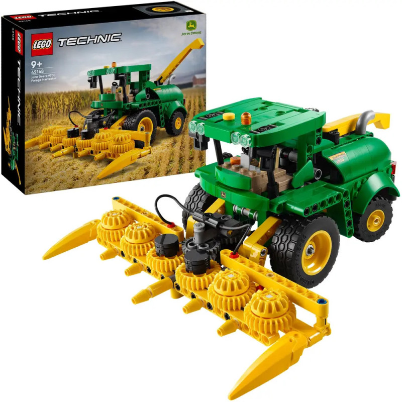 LEGO Technic John Deere Traktor mit gelbem Frontanbau, im Hintergrund ist die Verpackung zu sehen.