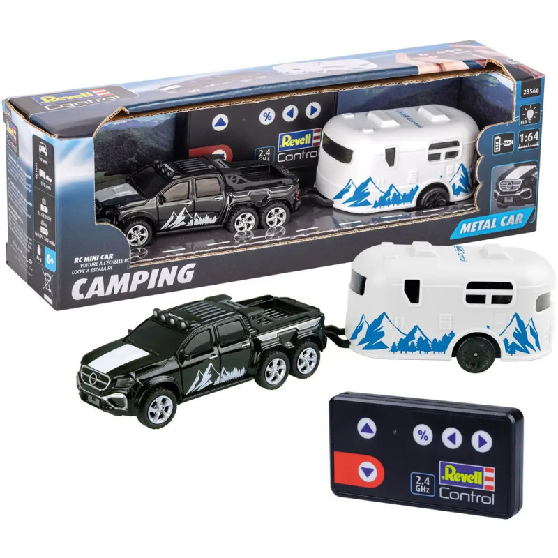 Ferngesteuertes schwarzes Truck- und weißes Camper-Spielzeugset in Box, mit Fernbedienung und Truck-Camper außen. Ferngesteuertes schwarzes Truck- und weißes Camper-Spielzeugset in Box, mit Fernbedienung und Truck-Camper außen.