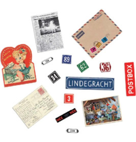 Verschiedene Vintage-Postkarten, Zeitung, Straßenschilder, Etiketten und ein Luftpostumschlag auf weißem Hintergrund.