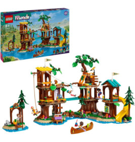 LEGO Friends Baumhaus-Set mit Figuren, Rutsche, Kanu und detaillierter Verpackung im Hintergrund.
