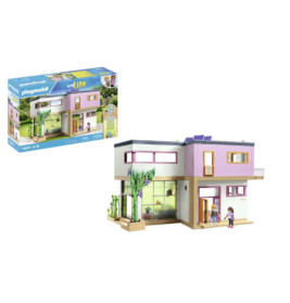 Playmobil Modernes Haus Set: Zweistöckiges Haus und zwei Figuren vor dem Haus, Verpackung im Hintergrund.