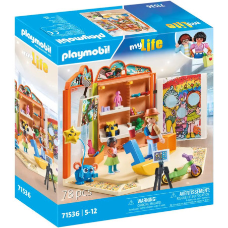 Playmobil myLife Kunststudio-Set mit 78 Teilen: Box zeigt bunte Figuren, Malutensilien und bemalte Wand.
