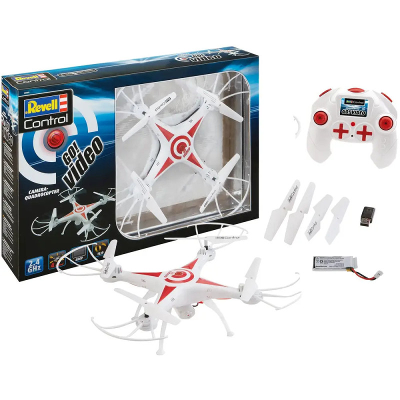 Revell Quadrocopter mit Fernbedienung, Ersatzrotoren, Akku, Ladegerät und Verpackung auf weißem Hintergrund.
