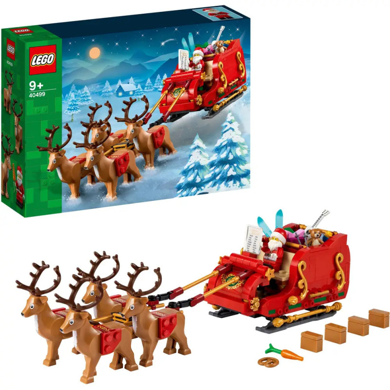 LEGO-Set: Weihnachtsmann-Schlitten mit Rentieren und Geschenken, vor winterlich-festlicher Kulisse abgebildet.