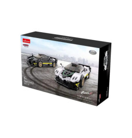 Verpackung eines Pagani Zonda R Spielzeugauto-Bausatzes mit zwei Autos und Stadt im Hintergrund.