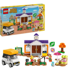 LEGO Animal Crossing Set mit Haus, Van, Bäumen, Figuren, Zubehör und Verpackung im Hintergrund.