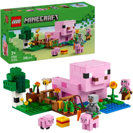 LEGO Minecraft Set mit rosa Schwein, Kleintieren, Minifiguren, Pflanzen und LEGO-Box im Hintergrund.