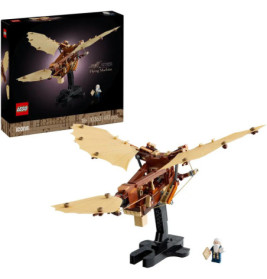 LEGO-Set von Da Vincis Flugmaschine mit beigen Flügeln, Minifigur, Ständer und Verpackung im Hintergrund.