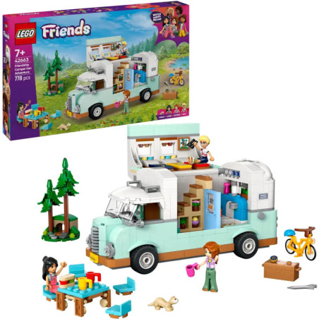 LEGO Friends Wohnmobil-Set mit Figuren, Bäumen, Picknicktisch, Fahrrad und Zubehör, Karton im Hintergrund.
