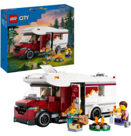 Lego Wohnmobil-Set mit Minifiguren beim Campen, Gitarrespielen und Kochen am Lagerfeuer. Box im Hintergrund.
