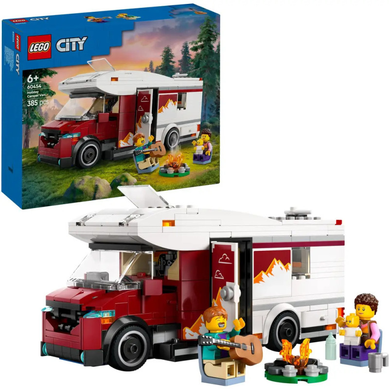 Lego Wohnmobil-Set mit Minifiguren beim Campen, Gitarrespielen und Kochen am Lagerfeuer. Box im Hintergrund.